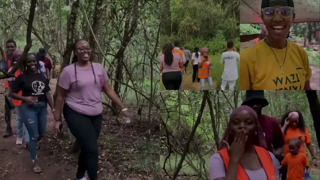 The Wazi community walks in the forest, plays group games and laughs together.