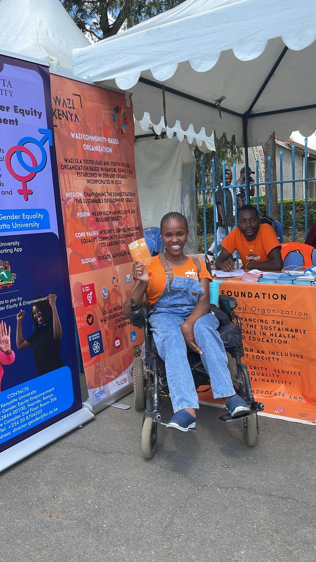 A Wazi participant in a wheelchair at the KU Centre for Gender Equity dispenser launch.