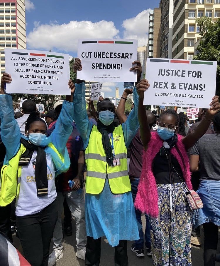 Placards at the Dignity in Public Service march.